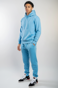 Three-quarter view of sky blue fleece sweatsuit set