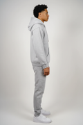 Side view of gray fleece sweatsuit set